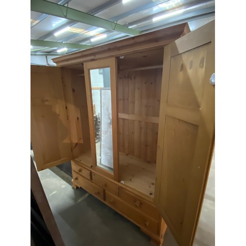 43 - Pine triple wardrobe with four drawers 190H 151W 58D (splits into 2 sections)