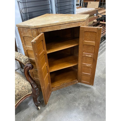 131 - Adzed oak two door corner cupboard (as found) 89H 81W 54D