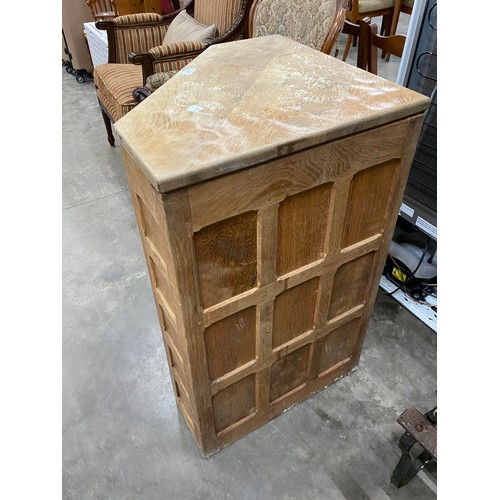 131 - Adzed oak two door corner cupboard (as found) 89H 81W 54D