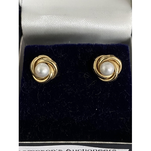 370 - Pair of 9ct gold pearl set earrings