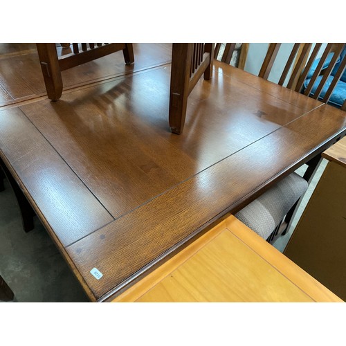 20 - Good quality oak extending dining table 77H 170-220W 112D and 8 chairs