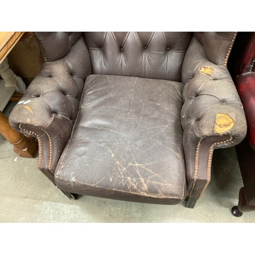 92 - Brown leather button back Chesterfield wing armchair 110H 85W & an Ox blood leather button back Ches... 