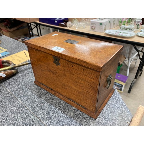 297 - Edwardian oak portable office/ writing box with silver mount inscribed 'Presented to Arthur T. Smith... 