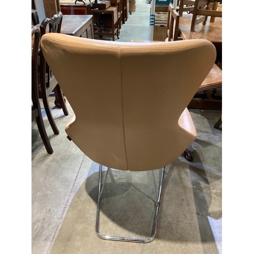 140 - Allermuir tan leather 'Famiglia' chair with chrome tilt frame 110H 66W