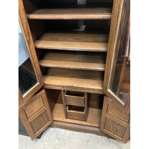 100 - Old Charm oak glazed cupboard 114H 54W 48D , oak effect bureau 107H 76W 37D and a mahogany effect gl... 