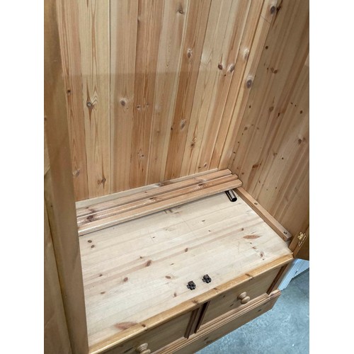 177 - Good quality four door/four drawer pine wardrobe (in one piece, but can be dismantled - please arran... 