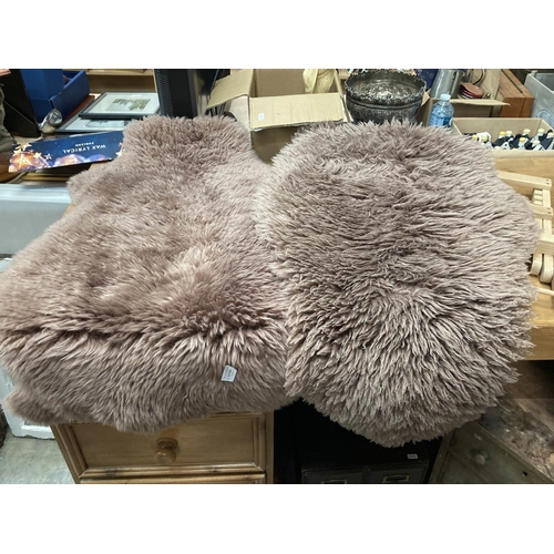 624 - 2 Ikea 'Skold' sheepskin rugs 90cm