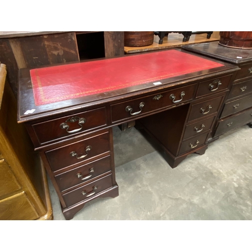 110 - Mahogany pedestal desk with red leather inset 77H 122W 61D
