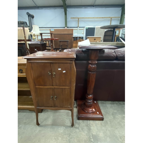 120 - Reproduction mahogany torchere 102H 38W 38D & a vintage mahogany music cabinet 93H 51W 39D