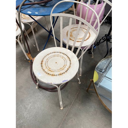 103 - French metal garden table 73H 60cm diameter, 4 chairs and hosepipe with reel