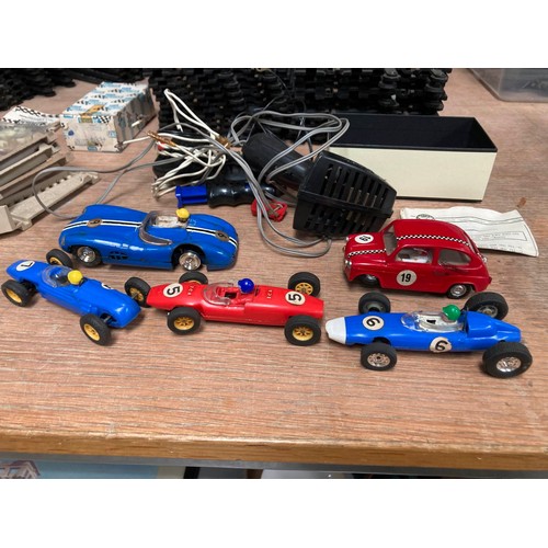 455 - Collection of early Scalextric & Tri-ang track, carriages, locomotive, P.C. Standard power unit, con... 