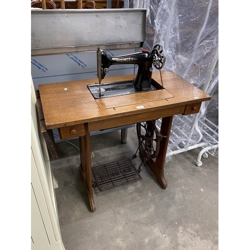 61 - Singer Y1676059 treadle sewing machine 75H 87W 42D