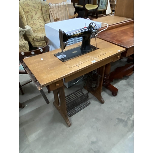61 - Singer Y1676059 treadle sewing machine 75H 87W 42D