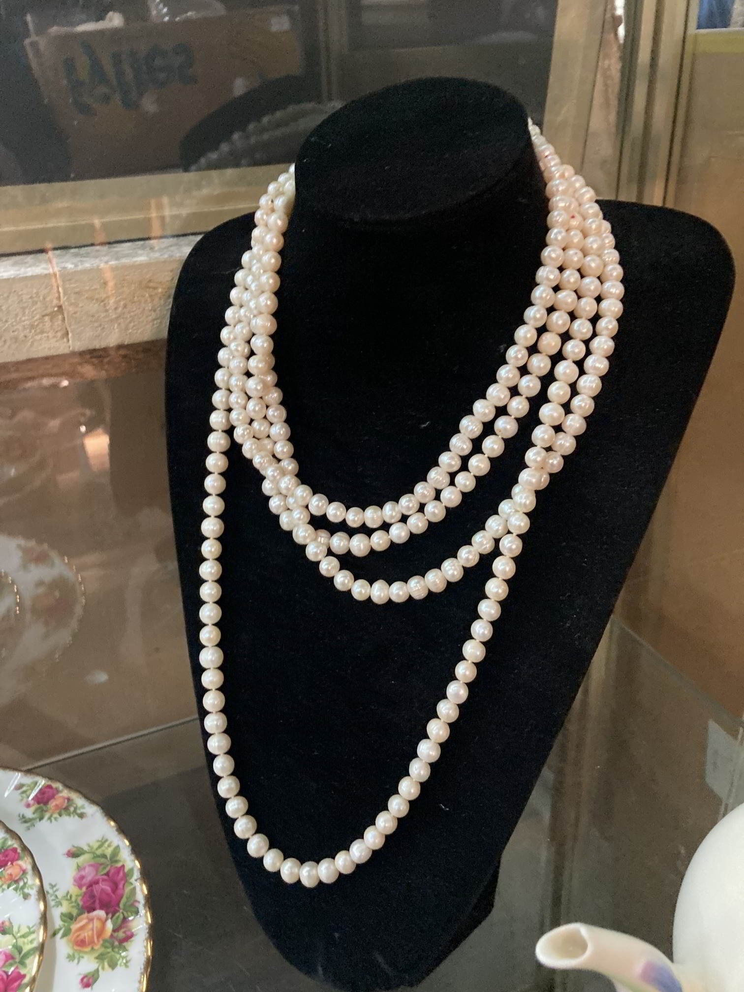 Two long strings of freshwater pearls, 108cm & 116cm