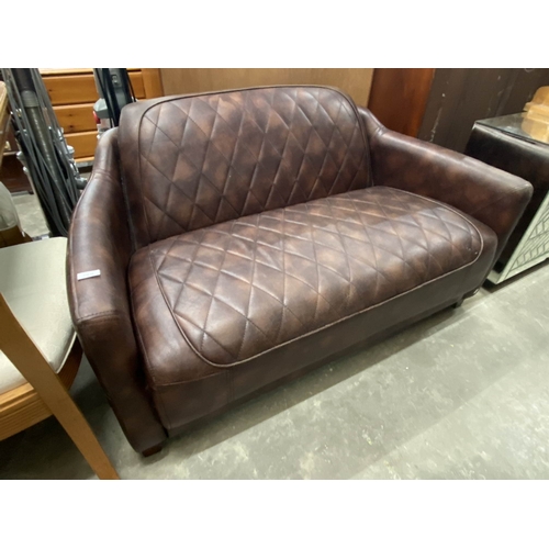 33 - Diamond quilted brown faux leather settee 135W