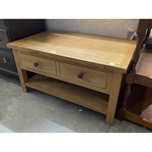 1 - Good quality oak double sided coffee table with one drawer 47H 90W 55D