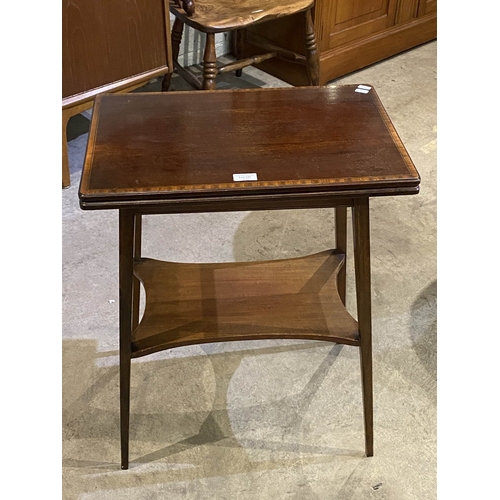 126 - Edwardian mahogany inlaid fold over games table 70H 56W 38D