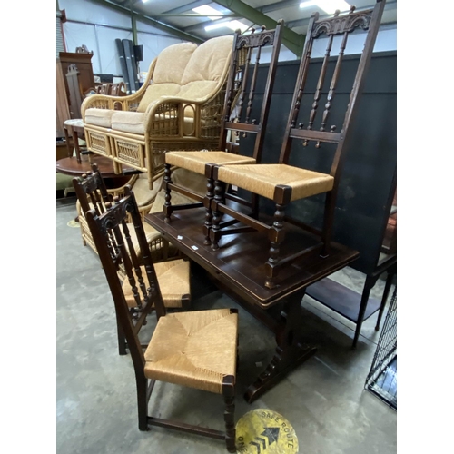 143 - Ercol 'Old Colonial' oak draw leaf table 74H 114-174W 72D & 4 chairs