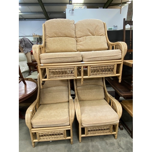 144 - Whitaker Cane Furniture three piece conservatory suite (settee 123W & 2 chairs 70W)