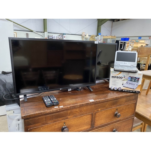 168 - LG 32LQ630B6LA & LG 32LM637BPLA TV's both with power leads and remotes & a Mustek MP80D portable DVD... 