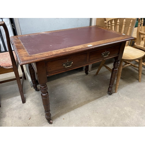 18 - Victorian oak two drawer writing desk with red leather inset 74H 106W 58D