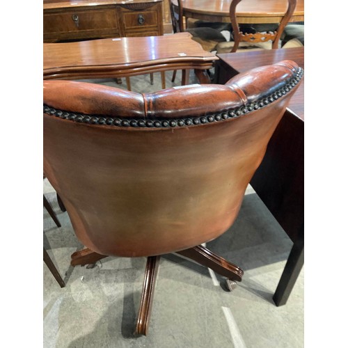 125 - Chesterfield button back swivel office chair in Bruciato colour leather, purchased from Smiths The R... 