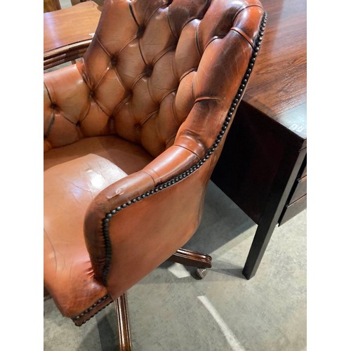 125 - Chesterfield button back swivel office chair in Bruciato colour leather, purchased from Smiths The R... 