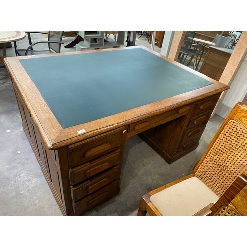 125 - Victorian oak partners desk with green leather inset 76H 118W 148D