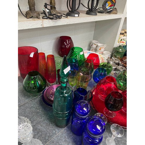 328 - Assorted coloured glass including cannisters, decanter