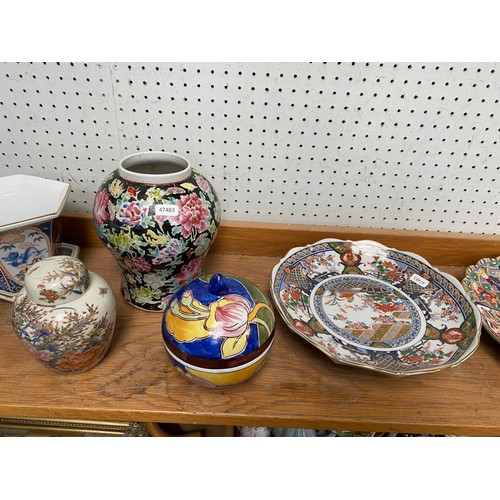 337 - Shelf of oriental tableware's including peacock plates, tea cups etc