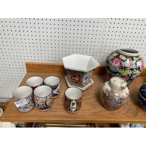 337 - Shelf of oriental tableware's including peacock plates, tea cups etc
