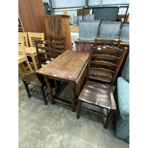 103 - Oak drop leaf table 73H 150W 91D and 4 ladderback chairs