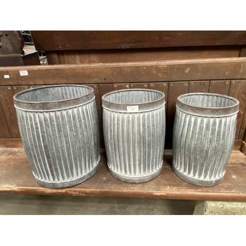 61 - 3 graduated galvanised planters  36H 34W 32D (NEW)