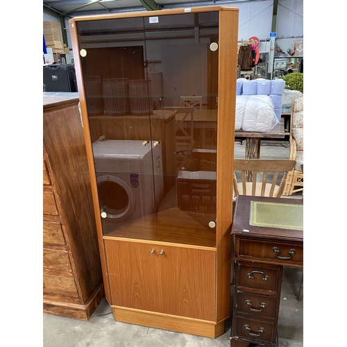 85 - Turnidge of London Ltd teak corner cupboard 171H 76W 44D