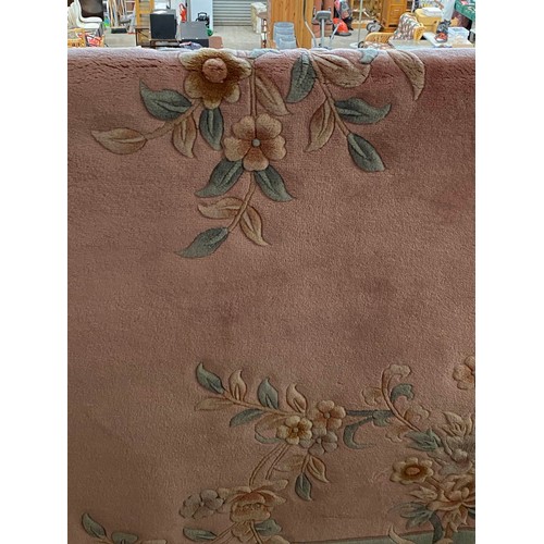 29 - Chinese pink ground 100% wool pile rug 2.74M x 1.83M (purchased from Harrods)