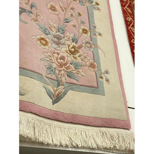 29 - Chinese pink ground 100% wool pile rug 2.74M x 1.83M (purchased from Harrods)