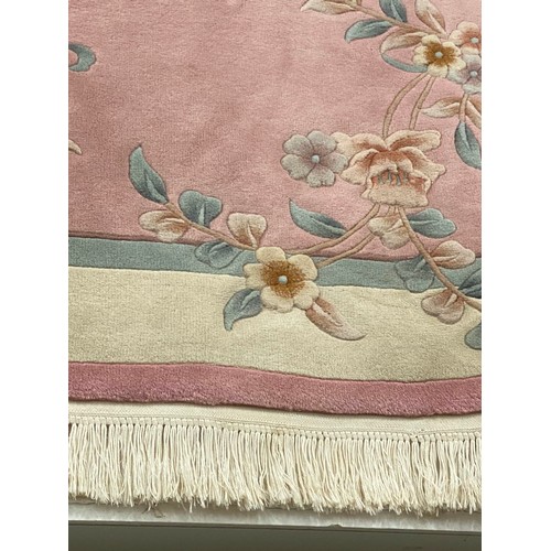 29 - Chinese pink ground 100% wool pile rug 2.74M x 1.83M (purchased from Harrods)