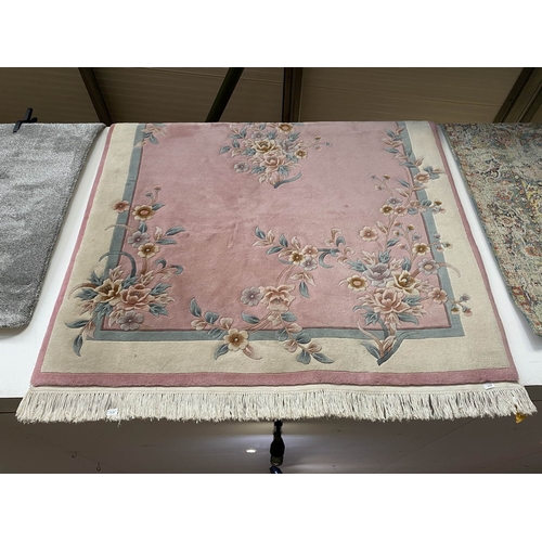 29 - Chinese pink ground 100% wool pile rug 2.74M x 1.83M (purchased from Harrods)
