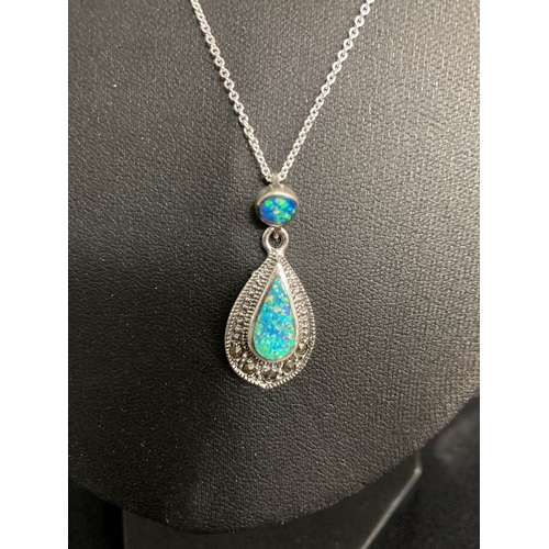 327 - Silver, blue opal & marcasite pendant on a silver chain (45cm)