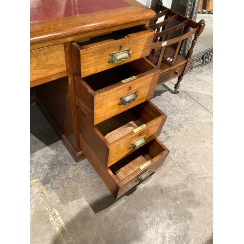 27 - Victorian mahogany pedestal campaign desk with brass handles and red leather inset 77H 122W 60D