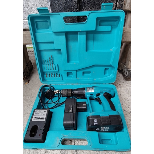 143 - Makita 24V Hammer Drill