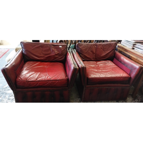 560 - Pair of Red Leather Armchairs