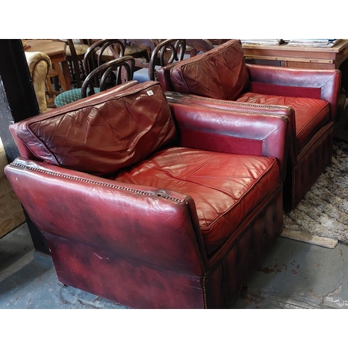 560 - Pair of Red Leather Armchairs