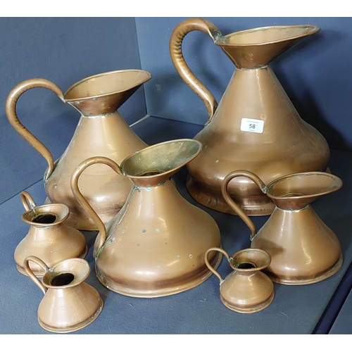 58 - Set of 7 Copper Graduated Jug Measures