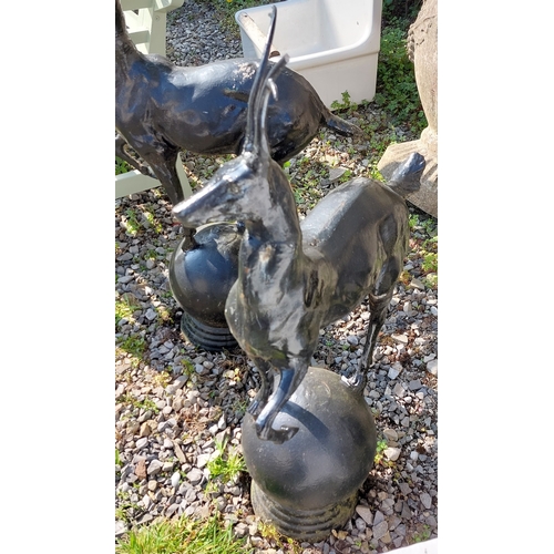 336 - Pair of Cast Iron Pier Tops of Standing Deer on Sphere - C. 90cm H