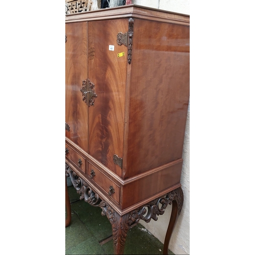 406 - Flamed Mahogany Drinks Cabinet on a 2-Drawer Carved Base - C. 70cm W x 50cm D x 153cm H