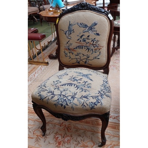 449 - Victorian Mahogany Carved Chair with Tapestry Cover and Brass Castors on the Front Legs