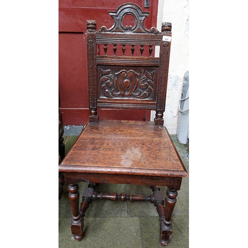 486 - Pair of Carved Oak Hall Chairs