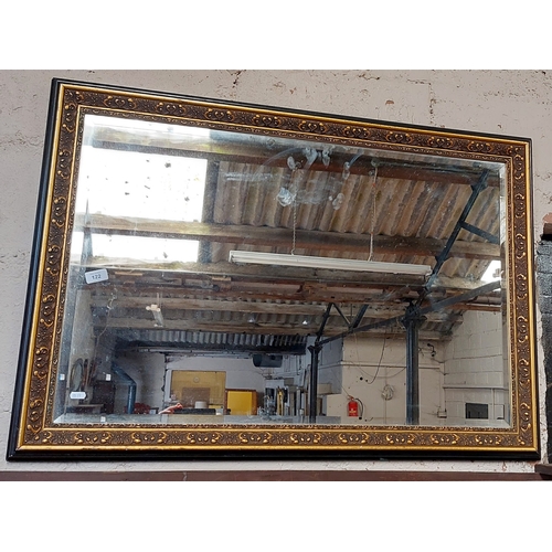 122 - Ebonised and Gilt Beveled Mirror - C. 105cm W x 72cm H