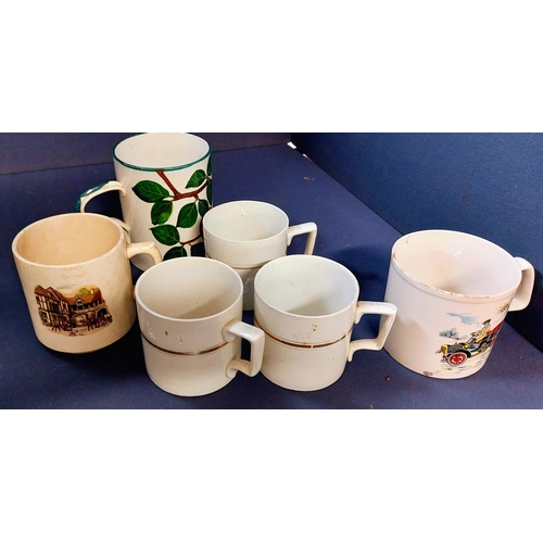 209 - Collection of 8 Mugs